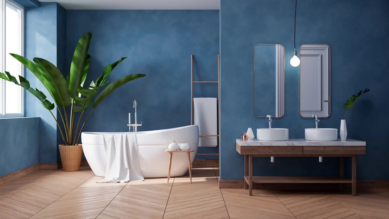 Diseño interior de baño moderno de lujo, bañera blanca sobre pared azul oscuro grunge.