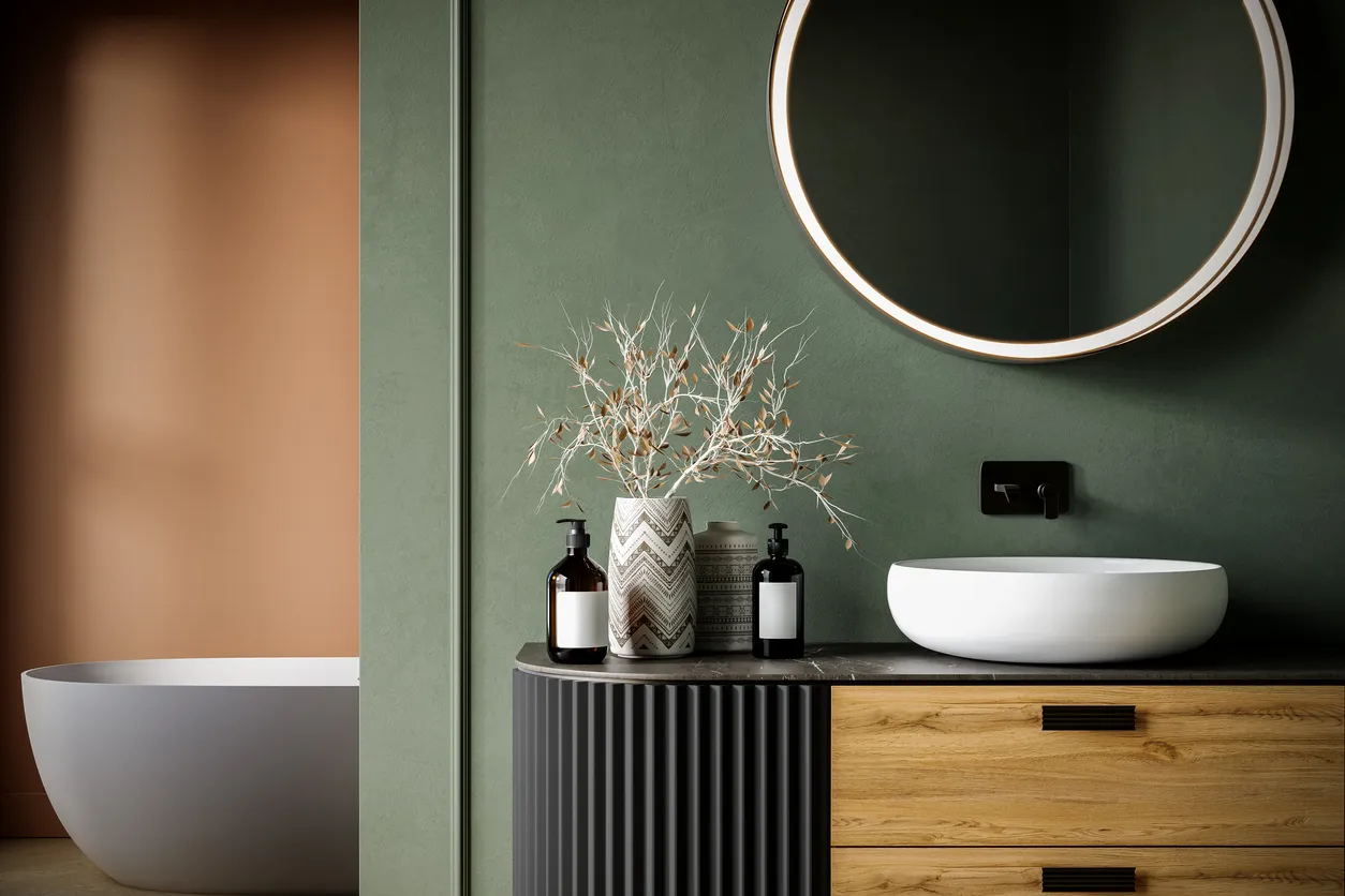 Espejo de baño redondo con luz led y mueble con lavabo de encimera