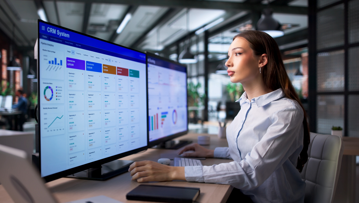 Sales Manager Woman Uses CRM Software Dashboard To Track Leads Efficientl