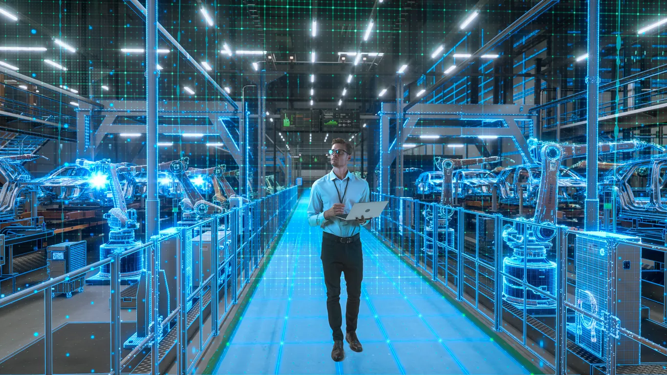 Un ingeniero con computadora portátil activa la digitalización