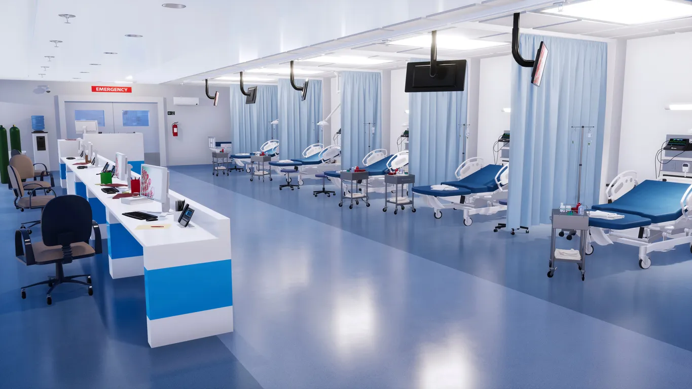 Enorme sala de urgencias de un hospital con una gran cantidad de camas