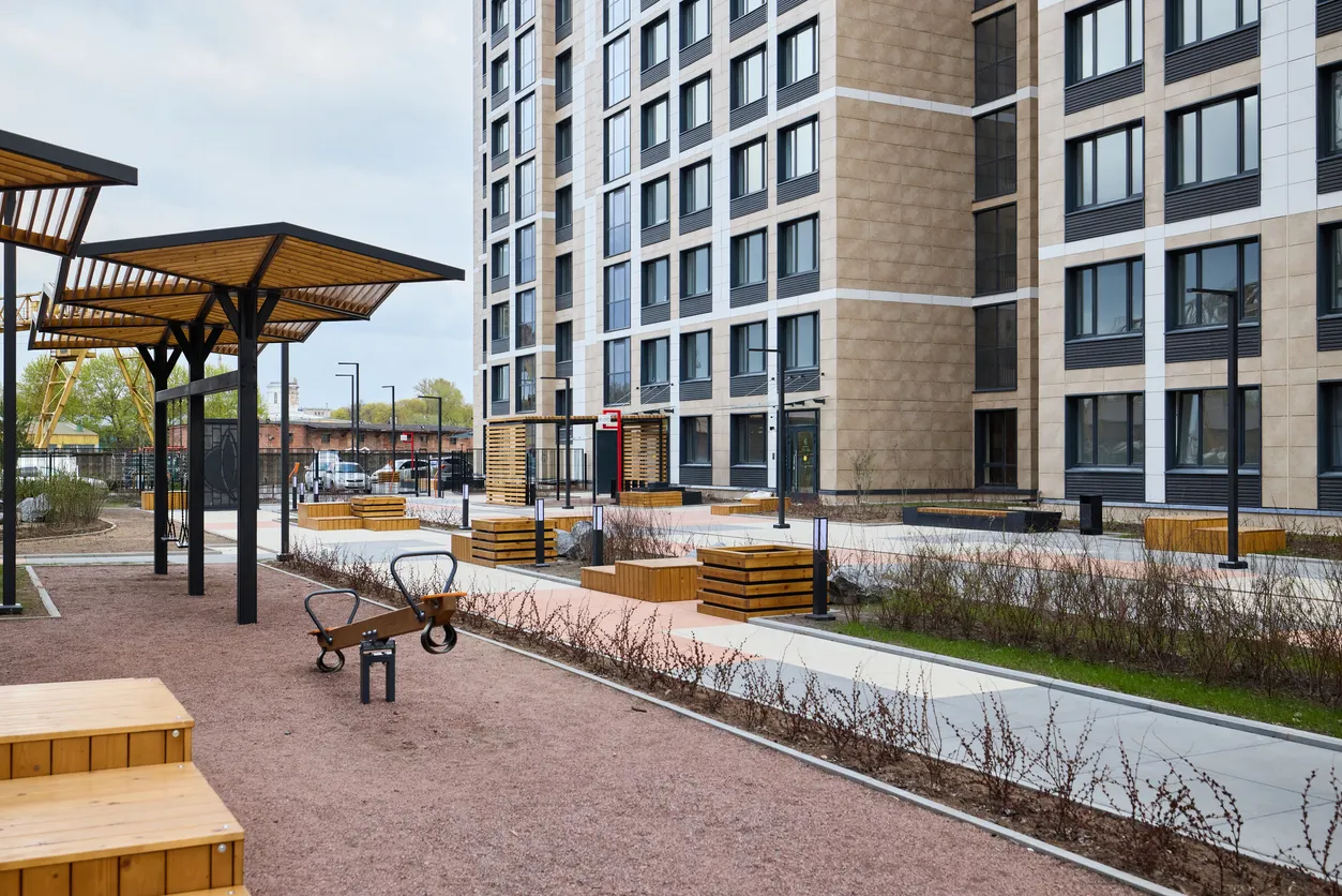 Moderno Desarrollo Residencial Urbano con Espacios Verdes Sostenibles y Amenidades Comunitarias