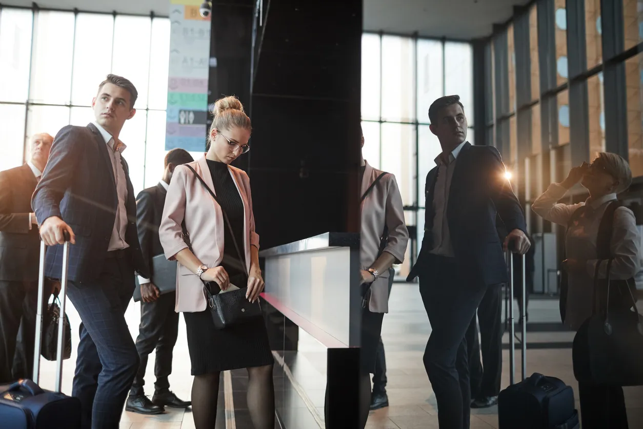 People registering at the airport stock photo